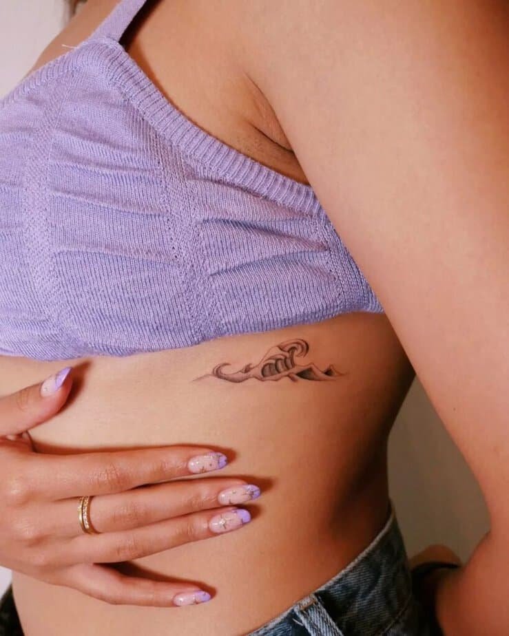 25 Jaw-Dropping Rib Tattoos That Make the Pain Totally Worth It