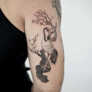 20 Jaw-Dropping Crane Tattoo Ideas (and the Secret Meanings Behind Each Design)