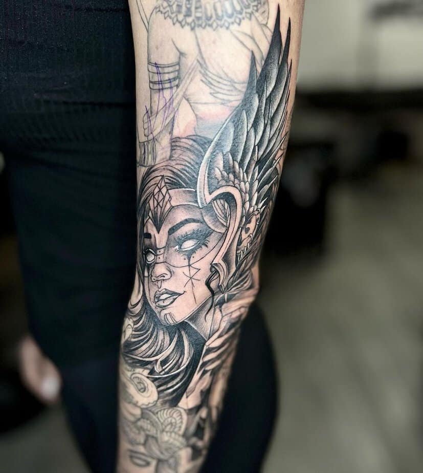 Female warrior tattoo sleeve
